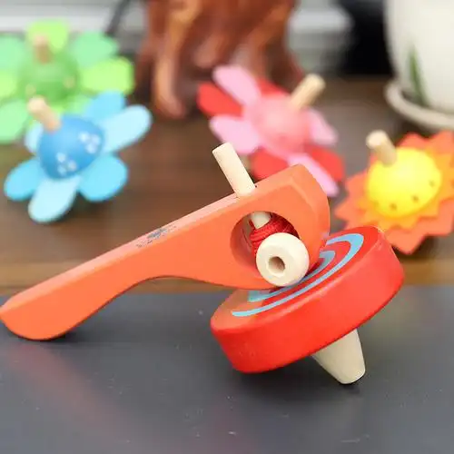 手转彩色旋转小陀螺幼儿园小学生男孩传统卡通木质新款玩具批发