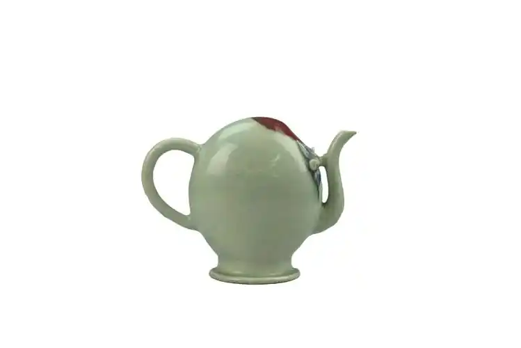 青花釉里红桃形倒流壶