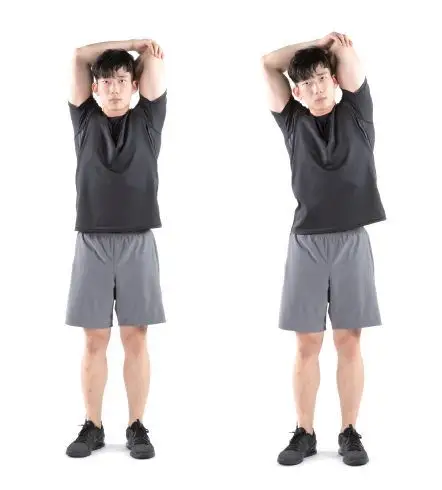 锻炼部位:肱三头肌身体自然站立,被拉伸的手触摸背后的斜方肌,另一只