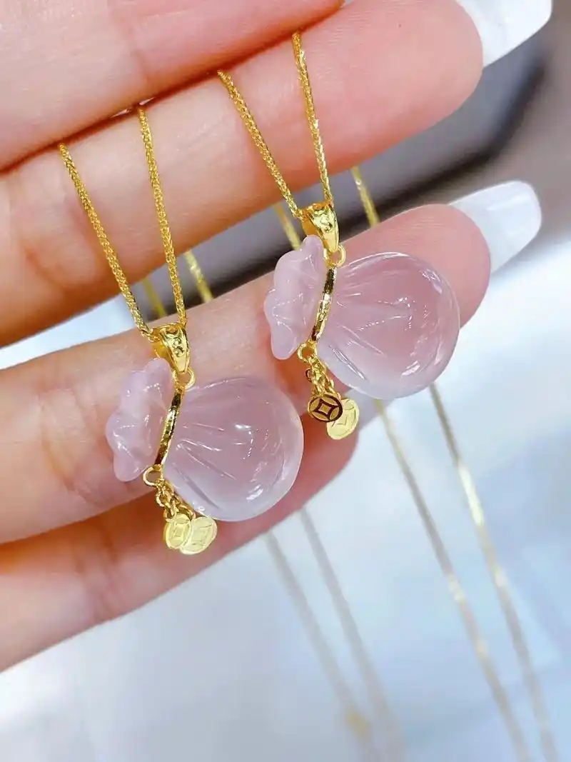 18k金芙蓉石吊坠.93这裸粉色的足金芙蓉石钱袋90也太可爱 - 抖音