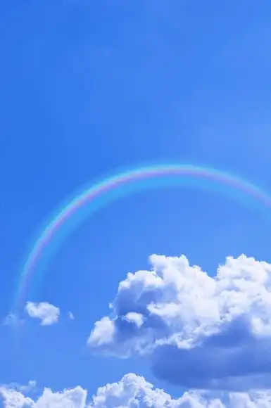 蓝天白云和彩虹照片摄影图片