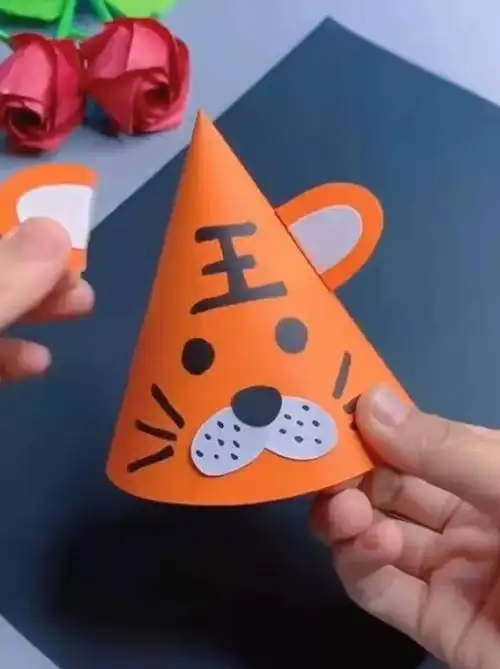 手工卡纸制作虎头帽