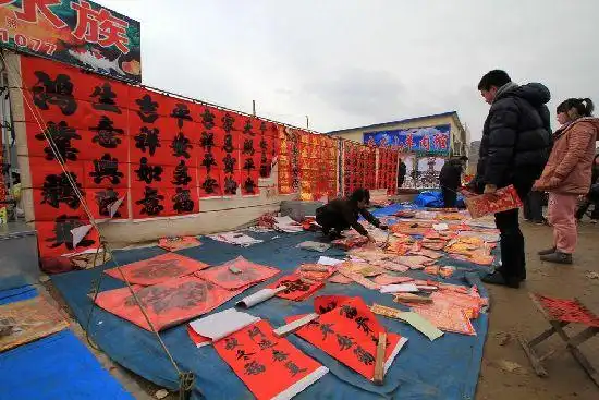 实拍百年沙子口大集 雨水浇不去的浓浓年味(图)