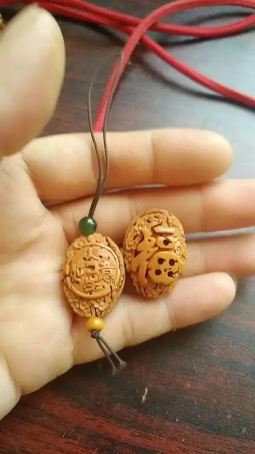 桃核雕刻人生如意,福寿三多