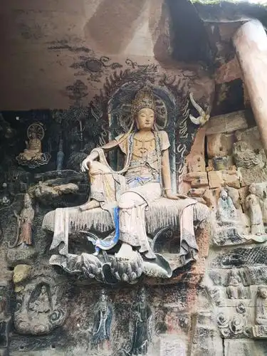 这个紫竹观音菩萨是毘卢洞的精华石刻.栩栩如生,形象俱佳!