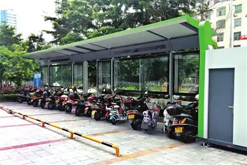 新建好的便民自行车站点,成了电动车停车场