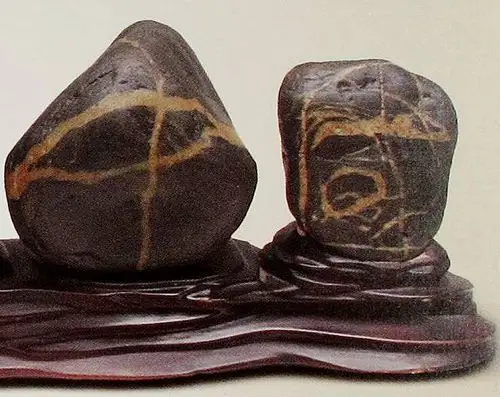 汉中古玩城两方文字奇石被盗