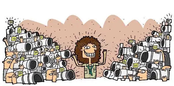 著名的人物被成群的狗仔队包围着照片