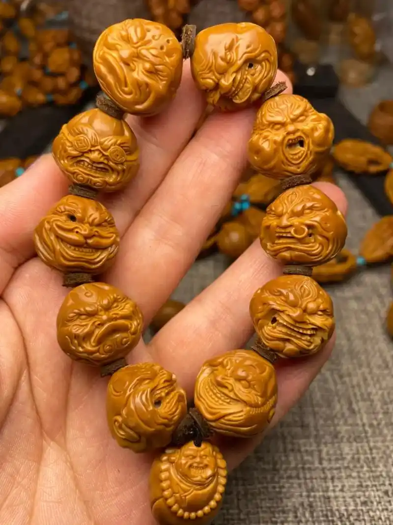 抖音图文来了 #橄榄核雕纯手工 #橄榄核 #文玩手串 #文 - 抖音