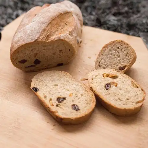 鹿家小丸子做的全麦葡萄干面包