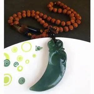 狗牙吊坠天然图片