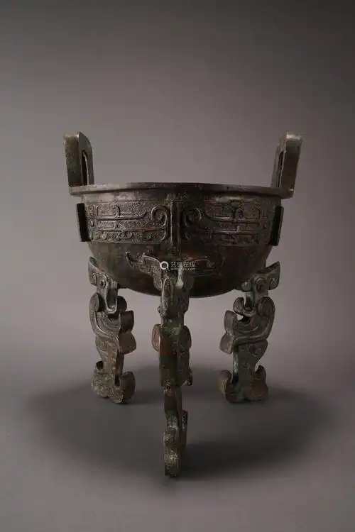 6868lot170568铜兽面纹夔凤三足鼎