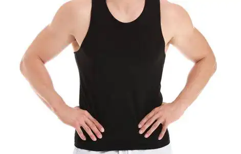 减肥男白底英俊肌肉男.减肥概念照片