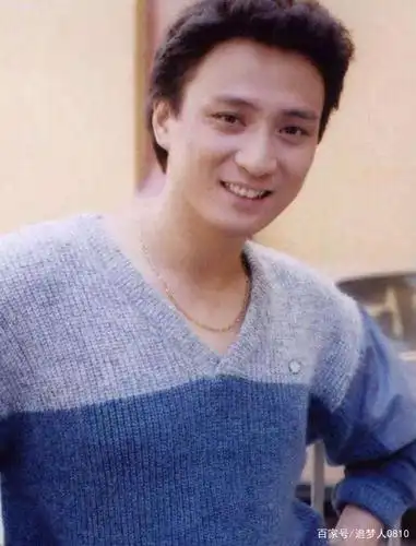 年轻时的汤镇业