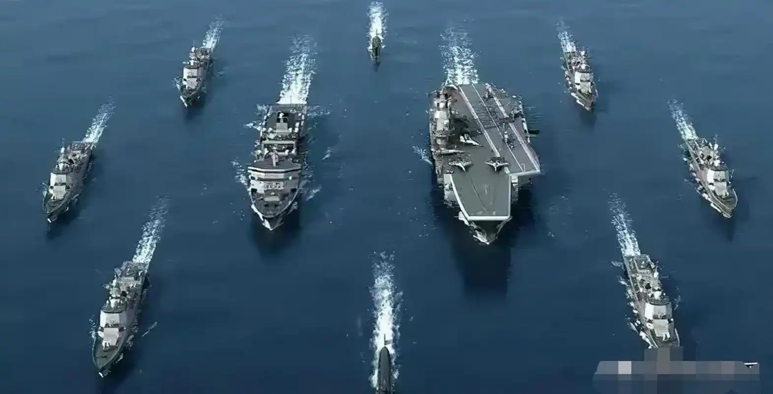 预计将由山东号航母携带055万吨大驱等8艘战舰组成庞大的航母战斗群