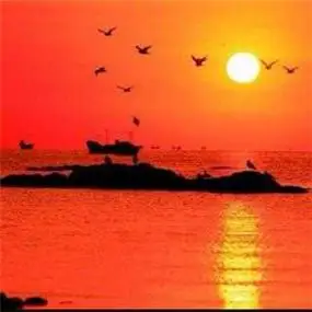 唯美好看光芒四射的红太阳图片头像