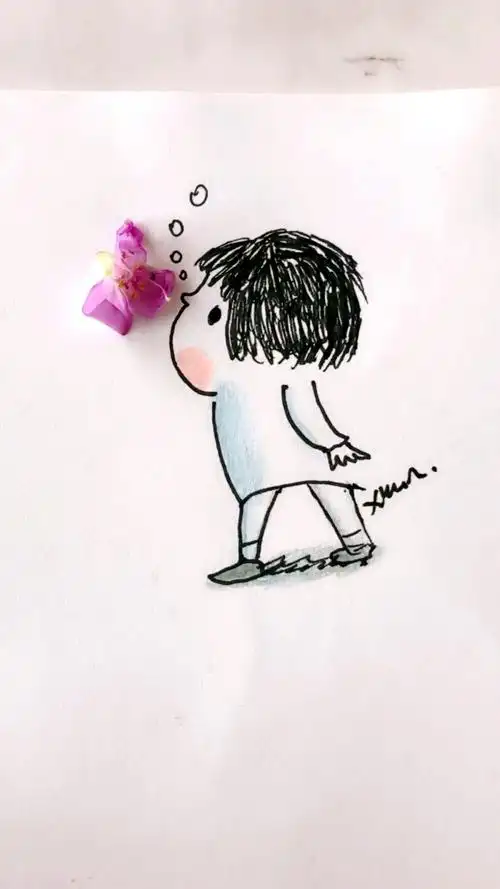 简笔画闻着花香的小女孩.