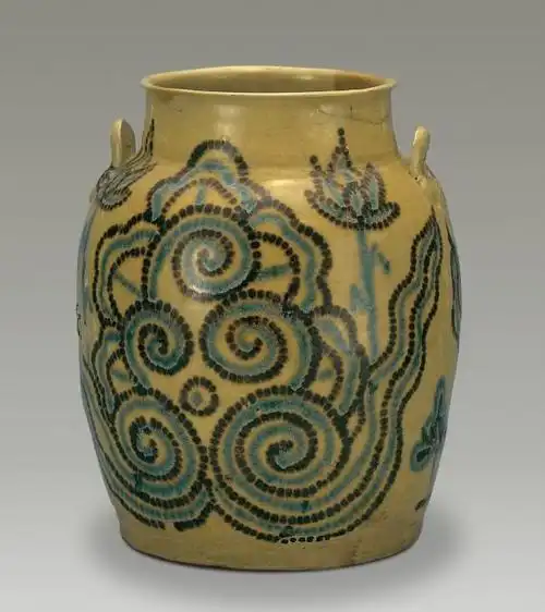 禁止出境文物之"青釉褐绿点彩云纹双耳罐"