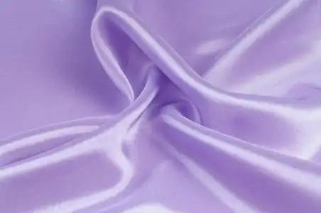 淡颜色织物的颜色淡紫色.纹理.淡粉紫颜色的照片
