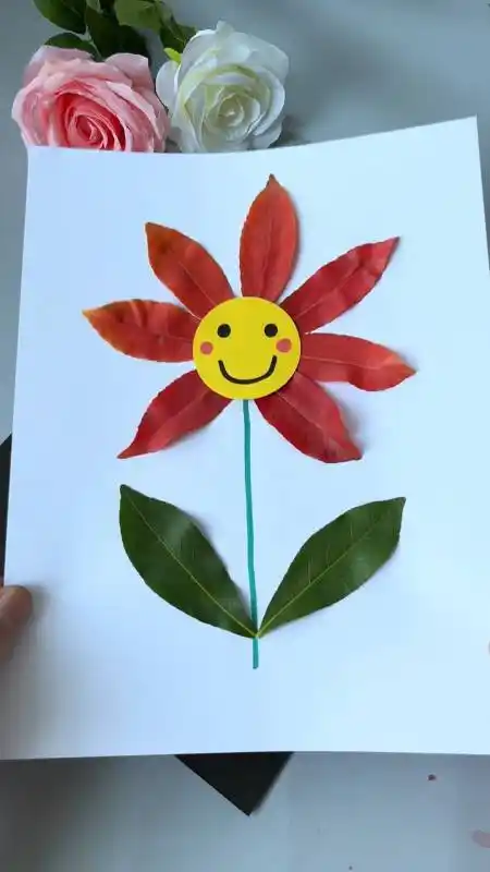 用美丽的落叶粘贴一幅花朵树叶贴画,简单又好看,快来试试-度小视