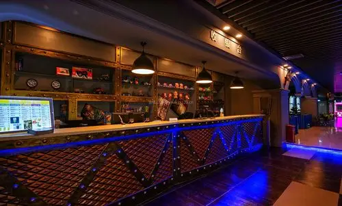 2022量贩式ktv前台布置设计图片_装信通网效果图