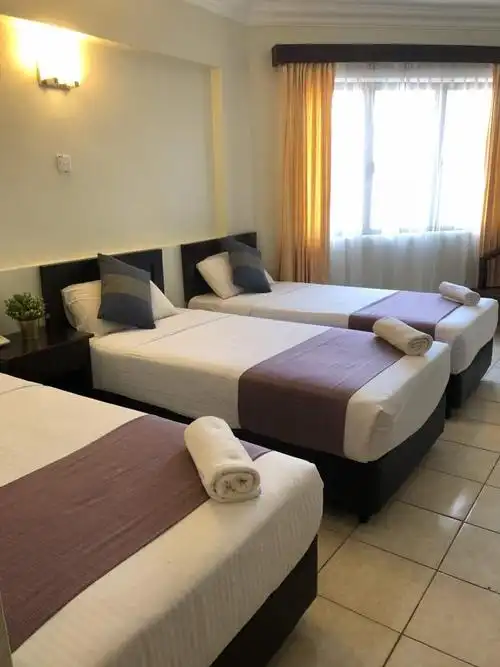 海滨豪华三人房 (deluxe seafront triple room)