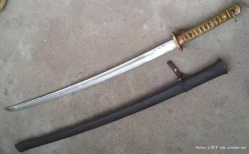 引用:   一面有昭和17年 小田一郎   一面有数字, 天皇字样.