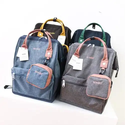 乐天日本双肩包竖款防水电脑包拼色时尚离家出走女书双肩背包