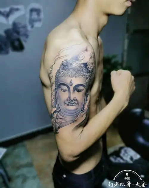 大臂如来佛祖未完待续纹身图片_手臂纹身图案