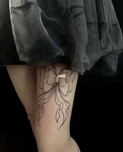 西安纹身蝴蝶结纹身女生纹身大腿纹身