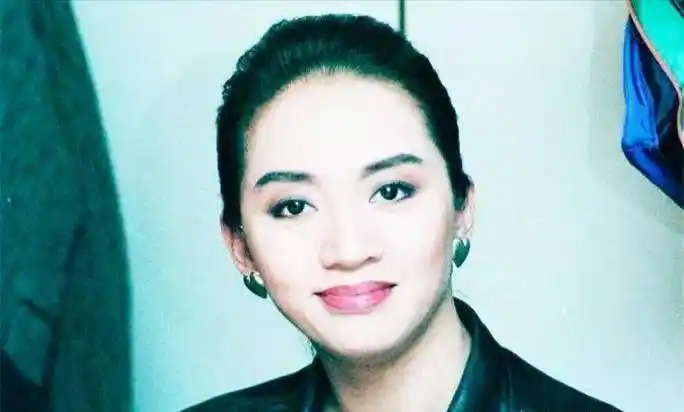 为什么梅艳芳被称为"香港姑娘",她代表着怎样的香港精神?