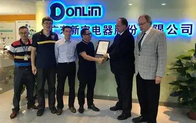 tuv南德广州分公司携德国首席技术专家参加新宝电器交流活动