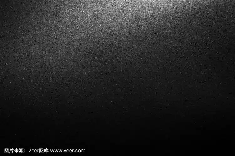 黑色的纸纹理或背景用聚光灯,深色的墙背景墙纸,深色的色调.