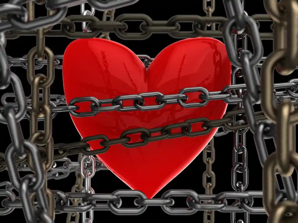 封闭的心,三维图链在黑色背景的心