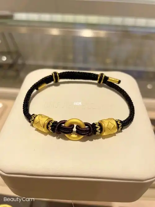 潮宏基男士平安扣编织手绳