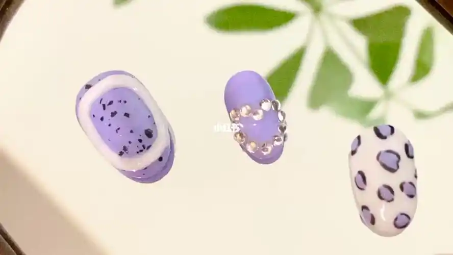 少女会爱的紫色美甲