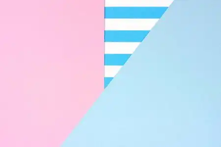 粉色条纹抽象背景带条纹图案的粉色和蓝色角抽象背景照片