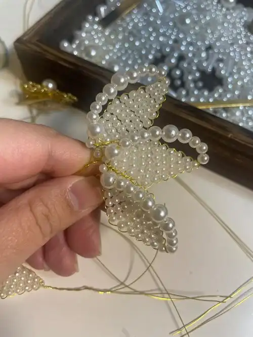 手工分享今天穿了新缉珠花