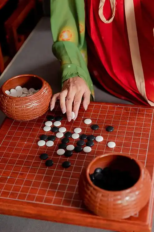 高清唐制古装汉服女性围棋文化人物摄影图