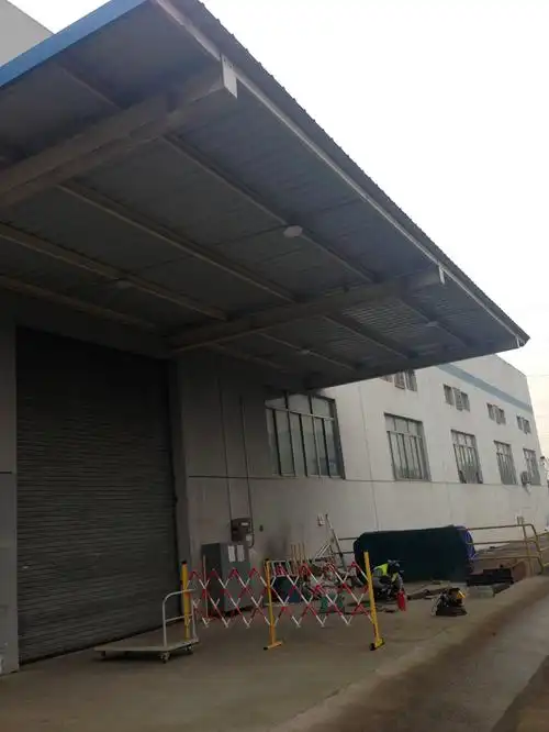 钢结构彩钢瓦雨棚-钢结构管桁架网架_钢结构车棚雨棚_苏州钢结构平台