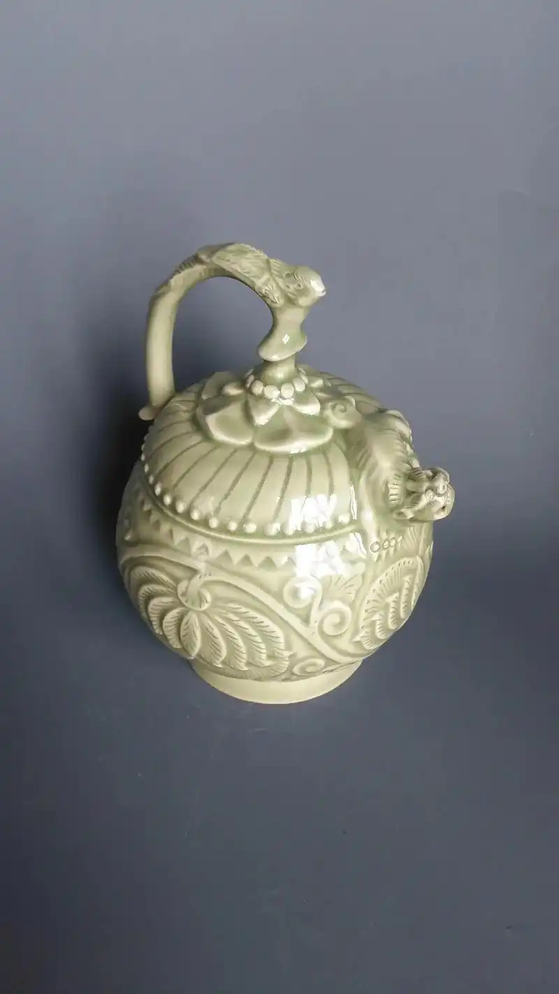 北宋耀州窑青釉刻划花狮口凤首提梁倒流壶赏晰#收藏 #中国瓷器 - 抖音