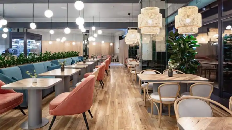 10万95平米现代商铺装修装修效果图,博物馆内的咖啡店装修案例效果图