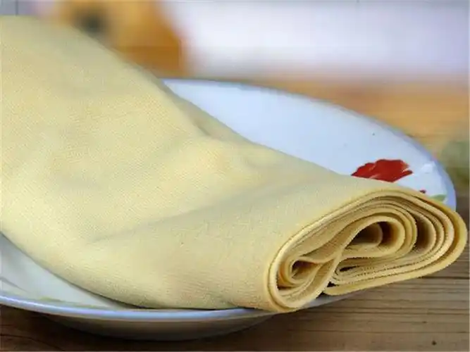 仿手工干豆腐皮机_曲阜鑫丰机械(在线咨询)_豆腐皮机