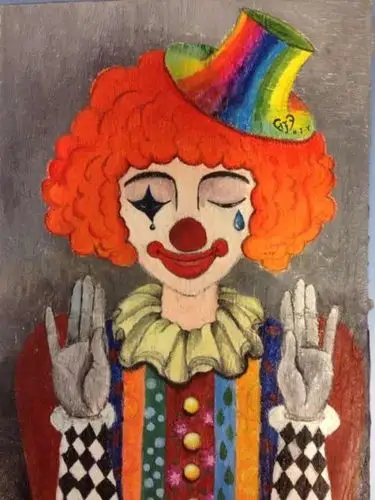 小丑右脸的星星和左脸的眼泪各代表什么?