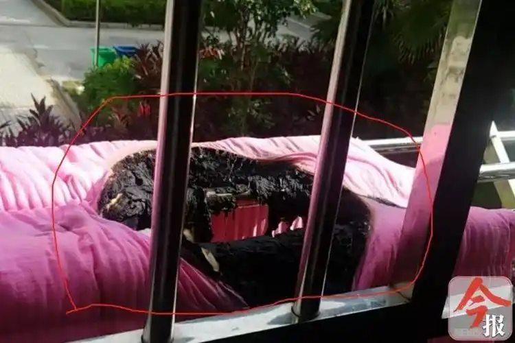 阳台晒棉被却突然起火,广西又见高空抛物,这回是烟头