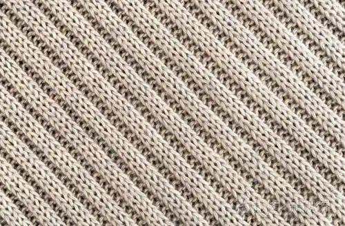 手工针织面料的背景毛霜彩布针织纹理.