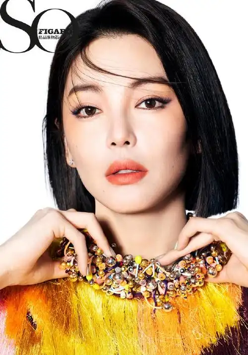 张雨绮冷御封面大片 绿色挑染一刀切彰显女王气场_明星发型 - 美发站