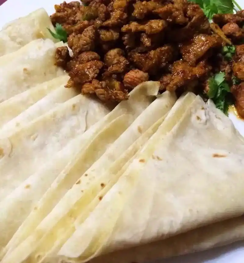 劲道清香的馓子烙馍包裹起酥脆咸香的金丝馓子,听起来风马牛不相及