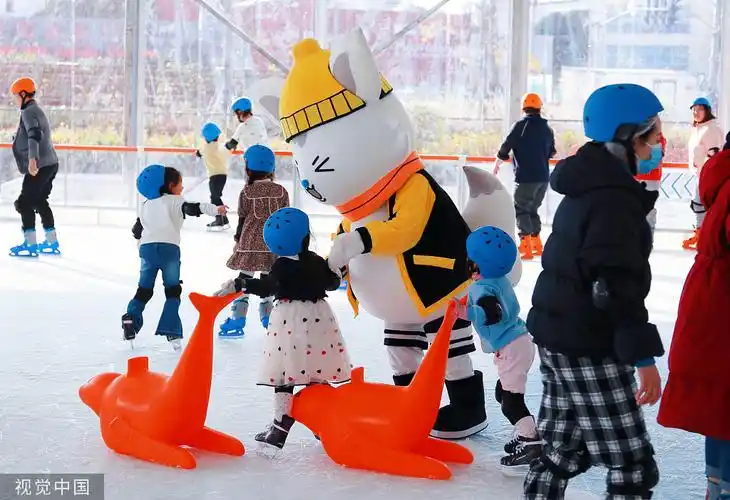 visitors enjoy ice skating at outdoor ice rink in shanghai