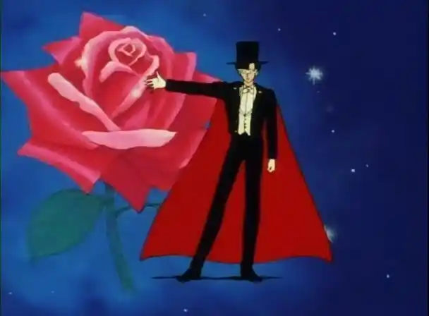 老是穿着黑色燕尾服,带着面具的他